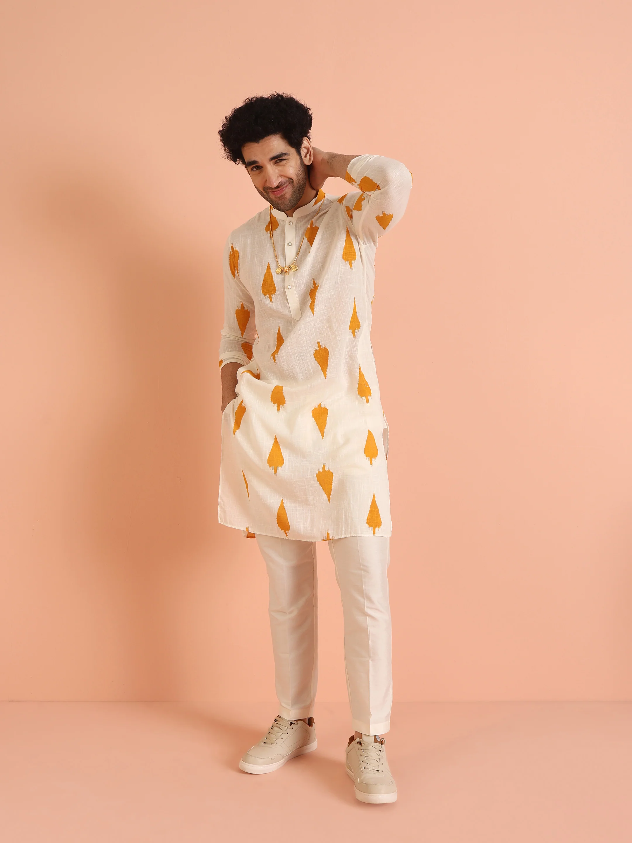 White Cotton Kurta Set with Mustard Ikat-Inspired Prints and Cream Trousers Festive & Wedding Ensemble - Image 2